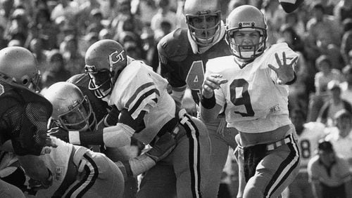Georgia Tech freshman quarterback Ken Whisenhunt pitches to a trailing back against Notre Dame on Saturday, Nov. 8, 1980. (Bill Mahan/AJC file)