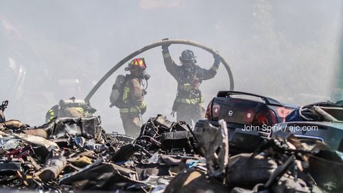 Multiple units worked to extinguish a fire at a northwest Atlanta junkyard.