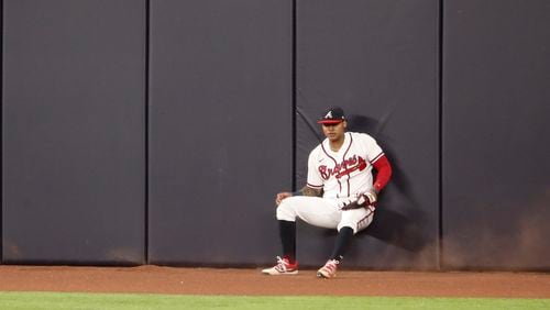 Atlanta Braves center fielder Cristian Pache catches a long drive by the Los Angeles Dodgers' Max Muncy in the eighth inning in Game 5 of the National League Championship Series on Friday, Oct. 16, 2020, at Globe Life Field in Arlington, Texas. (Curtis Compton/Atlanta Journal-Constitution/TNS)