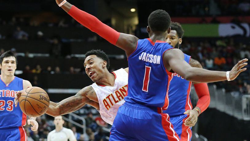 Hawks guard Jeff Teague is fouled by Pistons guard Reggie Jackson on his way to the basket in a basketball game on Wednesday, Dec. 23, 2015, in Atlanta. Curtis Compton / ccompton@ajc.com
