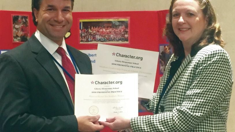 Liberty Elementary School principal Doug Knott and assistant principal Pam Green accepted the school’s award at the National Forum on Character Education in Washington., D.C.