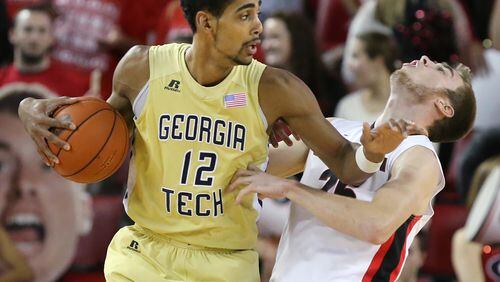 Georgia Tech forward Quinton Stephens collides with Georgia defender Kenny Paul Geno in a game on Saturday, Dec. 19, 2015, in Athens. Curtis Compton / ccompton@ajc.com