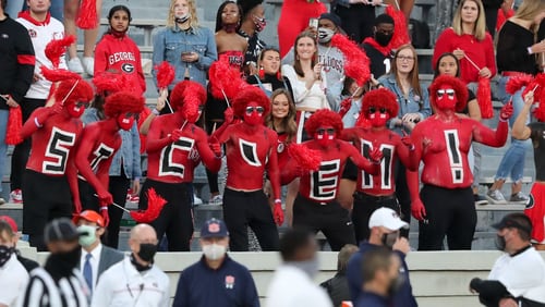 Georgia fans cheer on their team before the Bulldogs' Oct. 3, 2020 game against Auburn. (Curtis Compton/AJC)