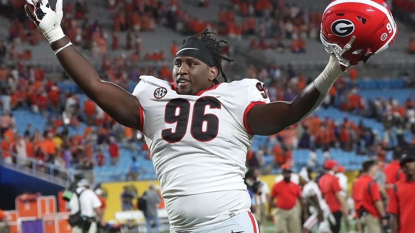Georgia defensive lineman Zion Logue reacts after a 10-3 victory over Clemson. (Curtis Compton / Curtis.Compton@ajc.com)