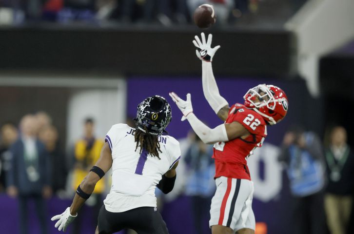 Georgia Bulldogs defensive back Javon Bullard (22) intercepts a pass intended for TCU Horned Frogs wide receiver Quentin Johnston (1) during the first half of the College Football Playoff National Championship at SoFi Stadium in Los Angeles on Monday, January 9, 2023. (Jason Getz / Jason.Getz@ajc.com)