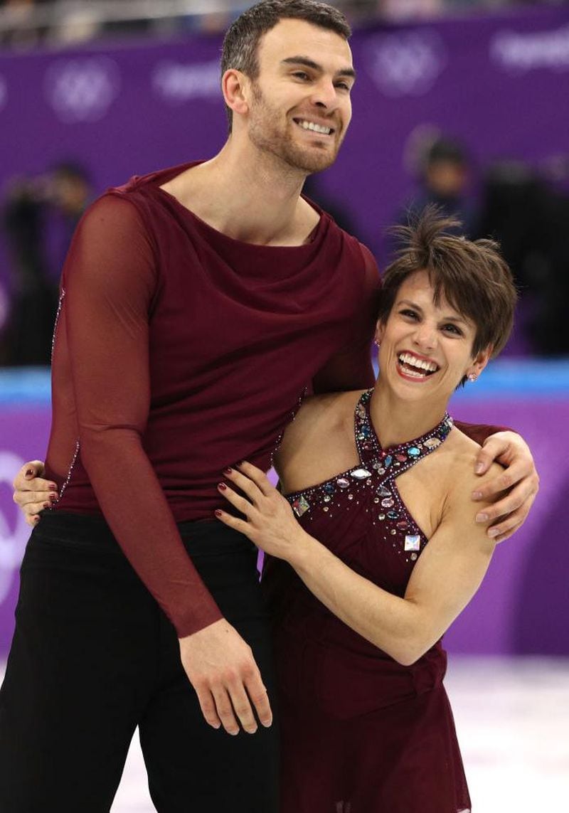 Pairs figure skater Meagan Duhamel and partner, Eric Radford, of Canada react after competing in the Figure Skating Team Event Pairs Free Skating on day two of the PyeongChang 2018 Winter Olympic Games at Gangneung Ice Arena on February 11, 2018 in Gangneung, South Korea. They helped Team Canada win gold.