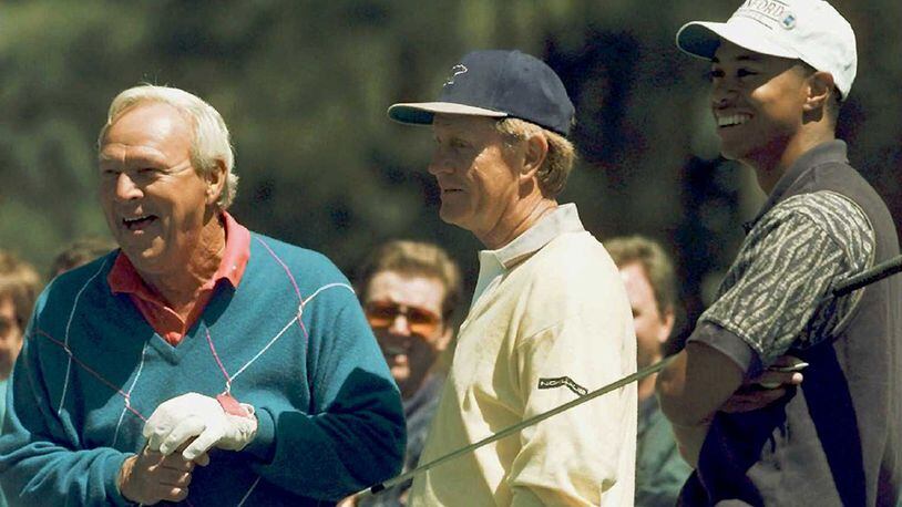 Before Tiger Woods turned pro in 1996, he hung out with Masters champions Arnold Palmer (left) and Jack Nicklaus.