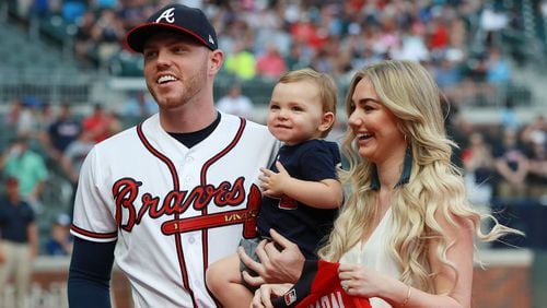 Braves All-Star Freddie Freeman is presented his All-Star jersey by his wife Chelsea and son Charlie before playing the Toronto Blue Jays in a MLB baseball game on Tuesday, July 10, 2018, in Atlanta. (Curtis Compton/ccompton@ajc.com)