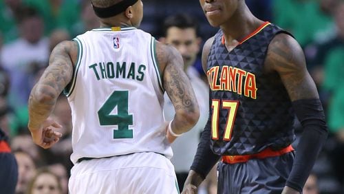 042216 BOSTON: Celtics guard Isaiah Thomas and Hawks guard Dennis Schroder are both called for technical fouls as they get into a scuffle during the first half in their NBA Eastern Conference first round playoff basketball game at TD Garden on Friday, April 22, 2016, in Boston. Curtis Compton / ccompton@ajc.comon