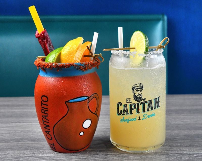 Two popular drinks at El Capitan are (from left) Canta Rito (tequila, orange, lime, grapefruit, soda with a pinch of salt) and Capitan Margarita (tequila, orange liqueur, Grand Marnier, fresh lime juice and agave). (Chris Hunt for The Atlanta Journal-Constitution)
