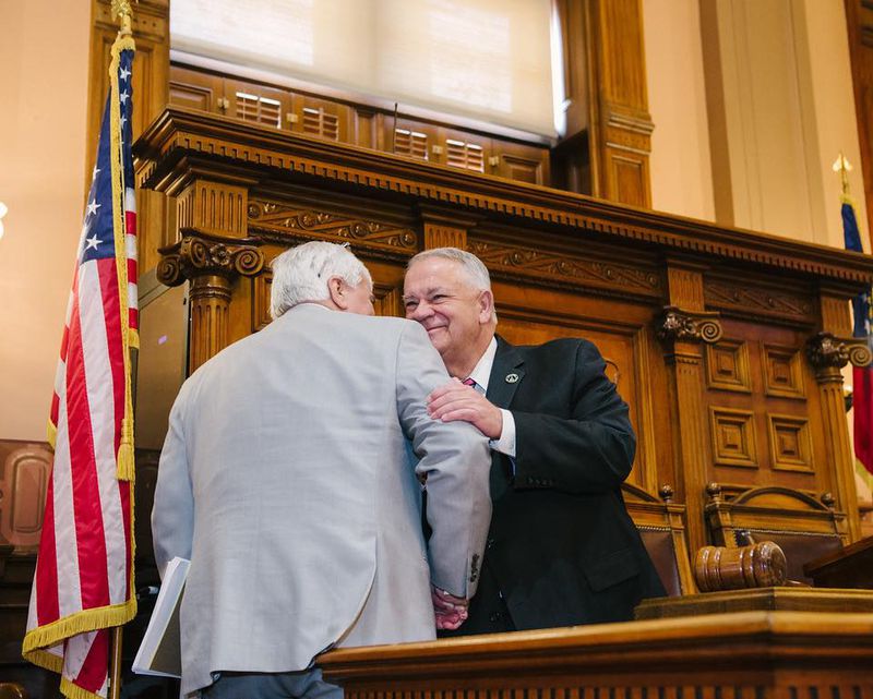 State Rep. Jay Powell, who died in November, was remembered as a "courageous" no-nonsense advocate for rural issues and fiscal conservatism. He's pictured here embracing House Speaker David Ralston.