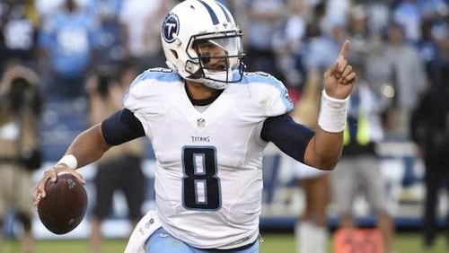 Tennessee Titans quarterback Marcus Mariota throws a pass during the second half of an NFL football game against the San Diego Chargers Sunday, Nov. 6, 2016, in San Diego. (AP Photo/Denis Poroy).jpg