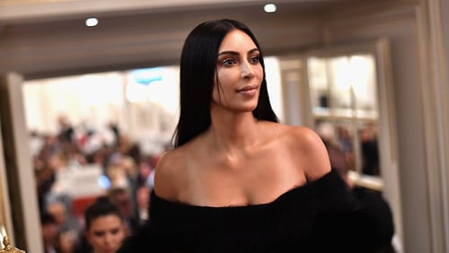 Reality TV star Kim Kardashian West is pictured here at Buro 24/7 Fashion Forward Initiative last September in Paris. She’s at the center of another social media storm over a post on the Manchester concert bombing.