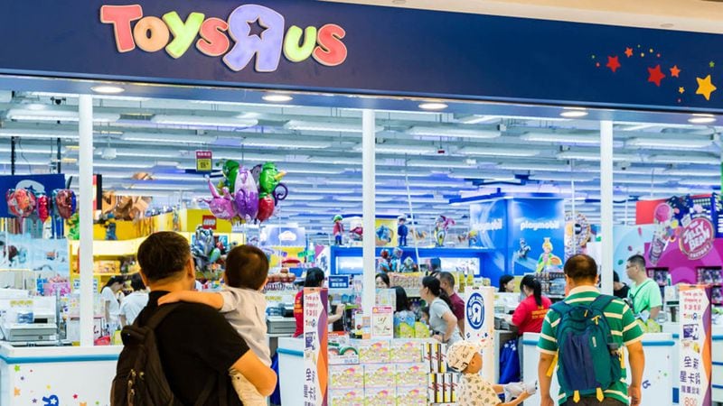 Hong Kong, Hong Kong - AUGUST 23: Shoppers walk towards to a Toys R US retail store at the Harbour City on August 23 2018 in Hong Kong.