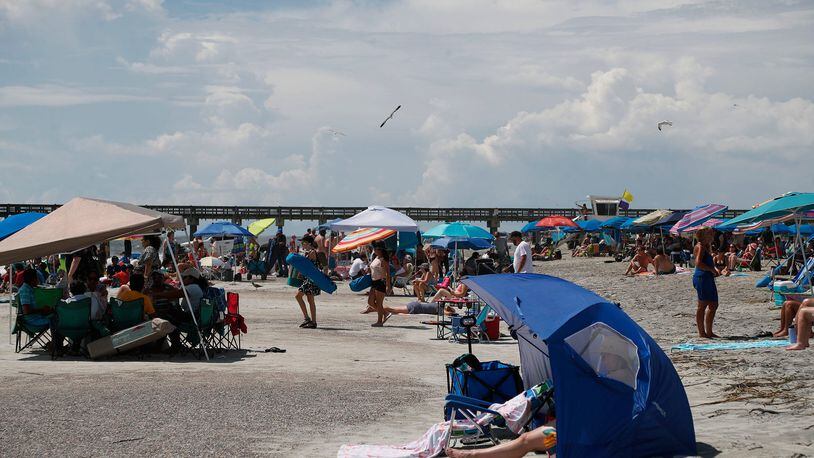 Rows of umbrellas and tents pack in over the Labor Day weekend on Tybee Island.