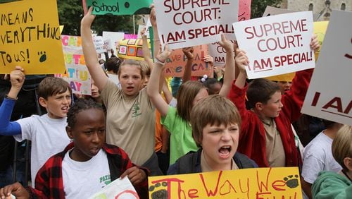 Supporters of state charter schools rally at the Capitol on Tuesday, May 17, 2011, a day after the. Georgia Supreme Court struck down the charter school commission.