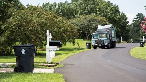 Peachtree City does not allow residential trash collection companies to charge extra for recycling pickup. AJC file photo