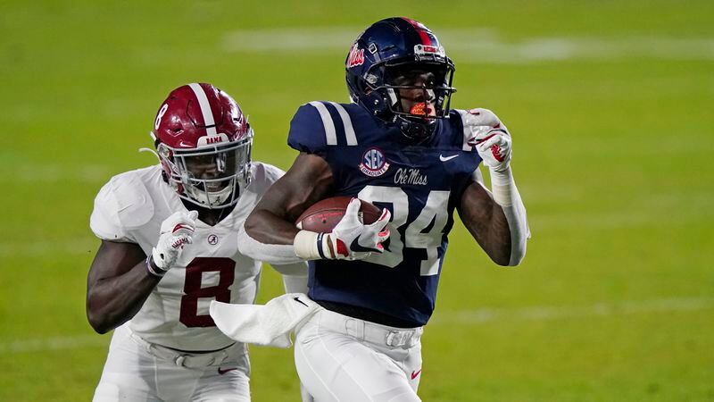 Mississippi tight end Kenny Yeboah (84) runs past Alabama linebacker Christian Harris (8) for long yardage during the first half Saturday, Oct. 10, 2020, in Oxford, Miss. (Rogelio V. Solis/AP)