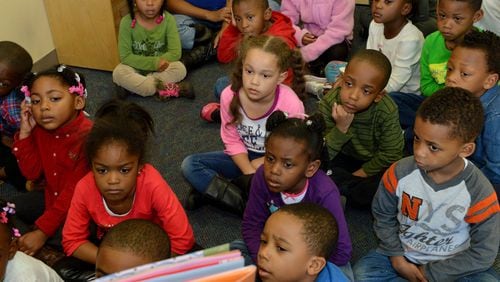 Pre-K students listen to a story at a school in Fulton County.  (AJC File Photo)