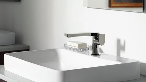 Minimalist faucets can incorporate beautifully understated contemporary designs centered around just the basic faucet elements, the handle and the spout. (Kohler)