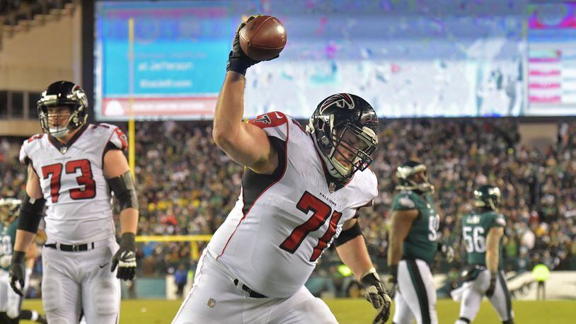 January 13, 2018 Philadelphia, PA - Atlanta Falcons offensive guard Wes Schweitzer (71) celebrates after Atlanta Falcons running back Devonta Freeman (24) scored a touchdown in the first half during the NFC Divisional Game at Lincoln Financial Field in Philadelphia, PA on Saturday, January 13, 2018. HYOSUB SHIN / HSHIN@AJC.COM