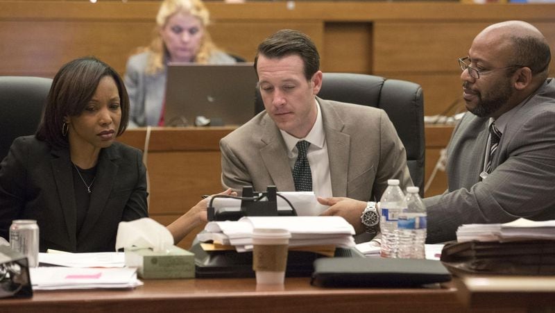 03/12/2018 — Atlanta, GA - Supervising Chief Senior Assistant District Attorney Seleta Griffin, from left, Fulton County Assistant District Attorney Adam Abatte, center, and Fulton County Chief Assistant District Attorney Clint Rucker, right, talk amongst themselves as they pick members of the jury during the sixth day of jury selection for the Tex McIver case before Fulton County Chief Judge Robert McBurney, Monday, March 12, 2018. A jury of 16 people were selected for the case on Monday. ALYSSA POINTER/ALYSSA.POINTER@AJC.COM