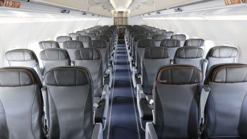 FILE - This Thursday, March 16, 2017, file photo shows the interior of a commercial airliner at John F. Kennedy International Airport in New York. Airlines are allowed to oversell flights, and they frequently do, because they assume that some passengers wonât show up. But there are some federal rules that apply. (AP Photo/Seth Wenig, File)