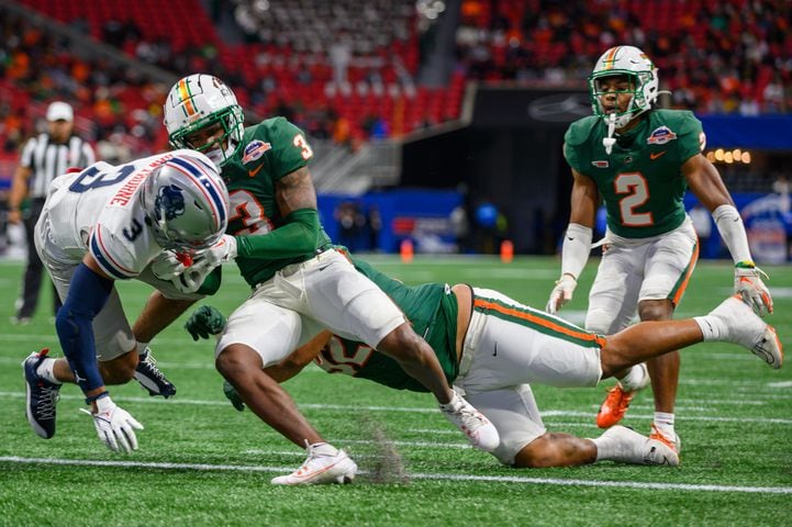 Howard wide receiver Kasey Hawthorne (3) pushes past Florida A&M defensive back Kendall Bohler for a touchdown at the Celebration Bowl at Mercedes Benz Stadium in Atlanta, Georgia on Dec. 16, 2023. (Jamie Spaar for the Atlanta Journal Constitution)