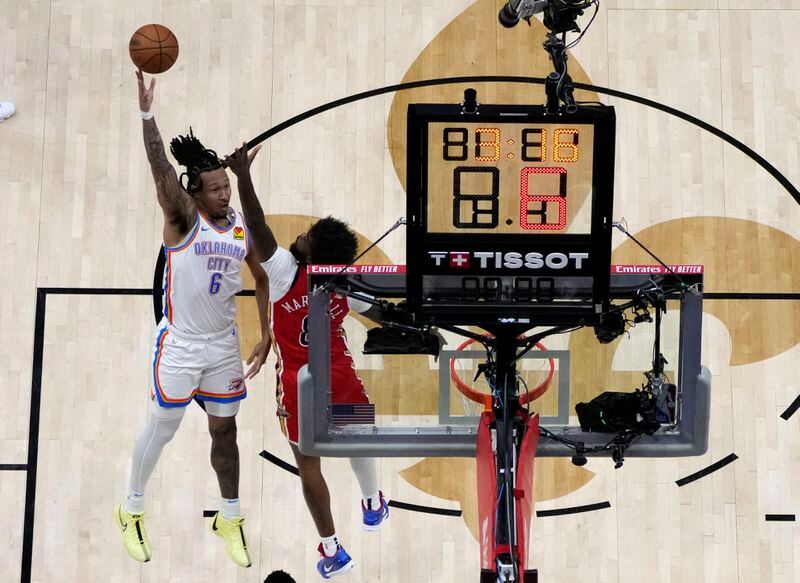 Oklahoma City Thunder forward Jaylin Williams (6) shoots against New Orleans Pelicans forward Naji Marshall in the first half of Game 3 of an NBA basketball first-round playoff series in New Orleans, Saturday, April 27, 2024. (AP Photo/Gerald Herbert)