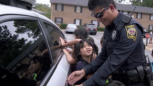 Bhutanese refugee Ryan Koirala is a police officer in Clarkston. Koirala’s was the leadoff story in our series on the “New Americans,” immigrants in Atlanta. Ryon Horne / rhorne@ajc.com