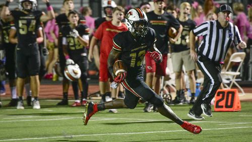 GAC WR Ty James is on his way to a touchdown against Dawson during a high school football game Friday, Oct.5, 2018, in Norcross. John Amis/Special