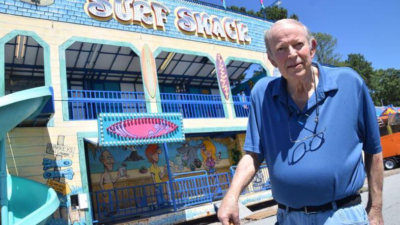 Longtime Gwinnett County Fairgrounds Manager Dale Thurman stands in front of the Surf Shack attraction while it is being set up for the 2022 Gwinnett County Fair. (Photo Courtesy of Curt Yeomans)
