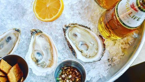 Head to One Eared Stag for $1 seafood and beer today. Photo credit: One Eared Stag.