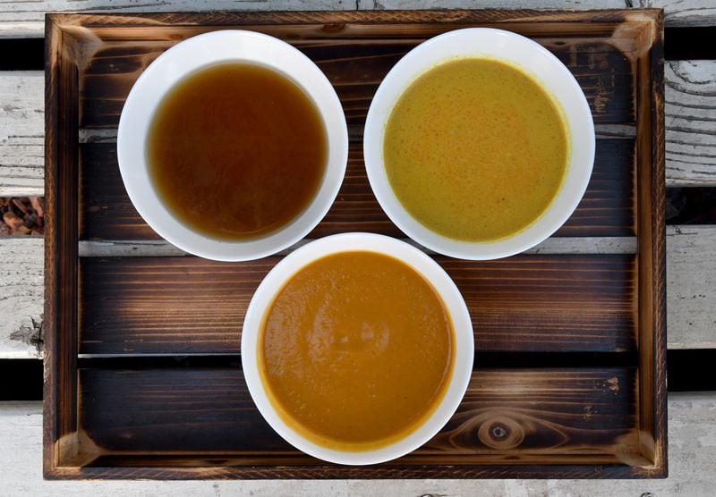 These three recipes for broths are from Stella Dillard, owner of Dandelion Food and Goods: (top row from left) Vegan Ramen Broth and Beef Curry Broth and (bottom) Sweet Potato Wonderbroth. (Styling by Stella Dillard / Chris Hunt for the AJC)