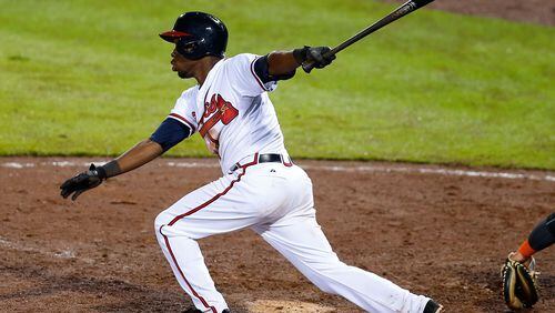 ATLANTA, GA - AUGUST 06: Eury Perez #14 of the Atlanta Braves hits an RBI single in the eighth inning to knock in the winning run during the game against the Miami Marlins at Turner Field on August 6, 2015 in Atlanta, Georgia. (Photo by Mike Zarrilli/Getty Images)