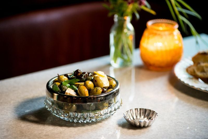 Cardinal’s marinated olives with feta arrive with an air of opulence. CONTRIBUTED BY MIA YAKEL