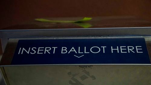 Voting rights advocates have filed another lawsuit challenging Georgia election rules, this time seeking to invalidate the state’s requirement that voters use a “pen and ink” signature on absentee ballot applications. (File photo by Alyssa Pointer / Alyssa.Pointer@ajc.com)