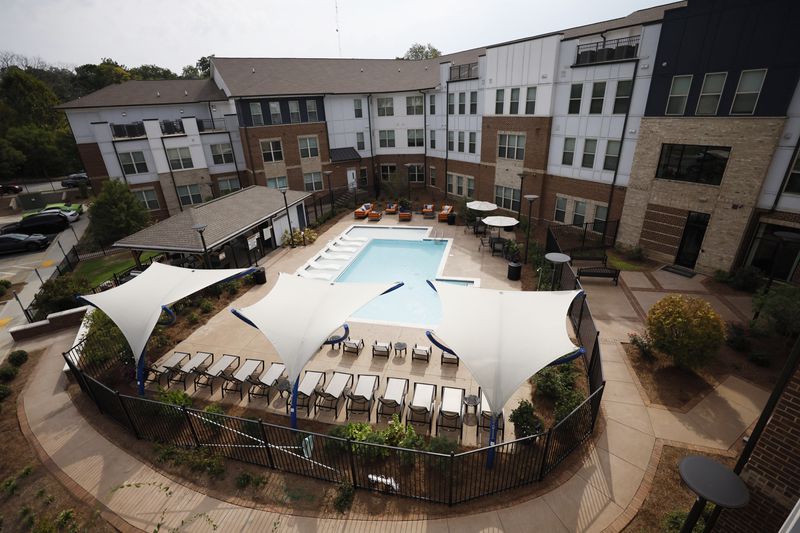 The pool view from the rooftop is seen during the tour of the mix-housing building at Ashley Scholar Landing on Tuesday, Sept. 26, 2023.  The beginning of the second phase of multi-family housing was announced at a press conference in Atlanta. 
Miguel Martinez /miguel.martinezjimenez@ajc.com