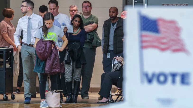 Voters waited over an hour at Henry W. Grady High School in Atlanta on Nov. 6, 2018. JOHN SPINK/JSPINK@AJC.COM