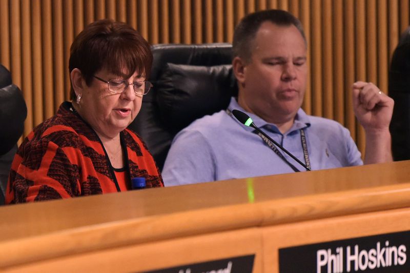 Gwinnett’s Board of Commissioners Chair Charlotte Nash, left, announces the approval of a new contract with MARTA on Wednesday, August 1 at the Gwinnett Justice and Administration Center auditorium. Commissioner Tommy Hunter, District 3, is right. JENNA EASON / JENNA.EASON@COXINC.COM