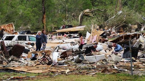 April 13, 2020 Chatsworth: Survivors and family friends dig through the remains of Deer Park trailer park after a deadly tornado killed at least 7 in Murray County on Monday, April 12, 2020, in Chatsworth.   Curtis Compton ccompton@ajc.com