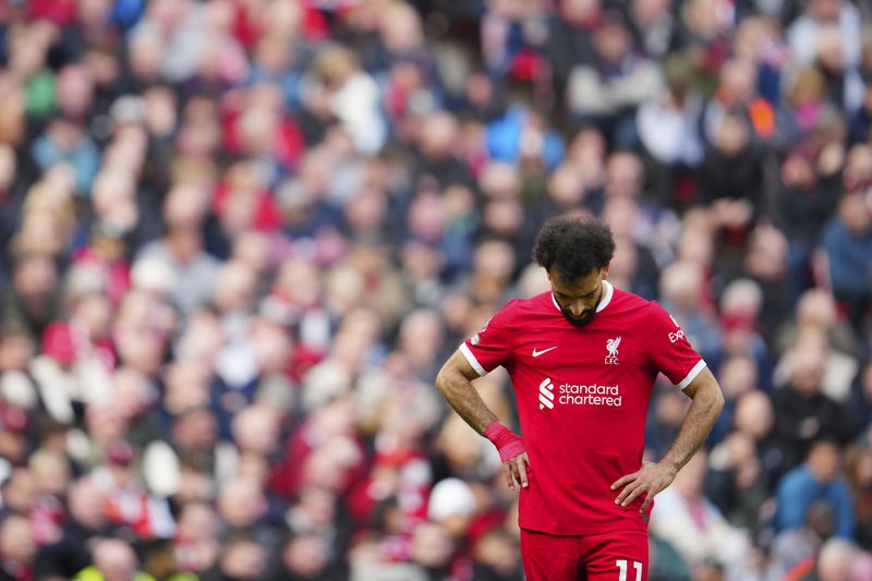 Liverpool's Mohamed Salah reacts during the English Premier League soccer match between Liverpool and Crystal Palace at Anfield Stadium in Liverpool, England, Sunday, April 14, 2024. (AP Photo/Jon Super)