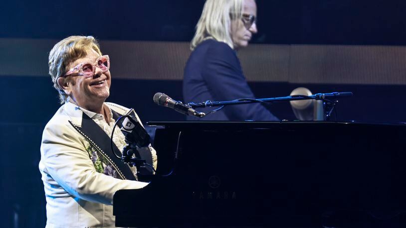 Elton John performs during Farewell Yellow Brick Road, The Final Tour at Mercedes Benz Stadium on Thursday, September 22, 2022.  (Natrice Miller / natrice.miller@ajc.com)