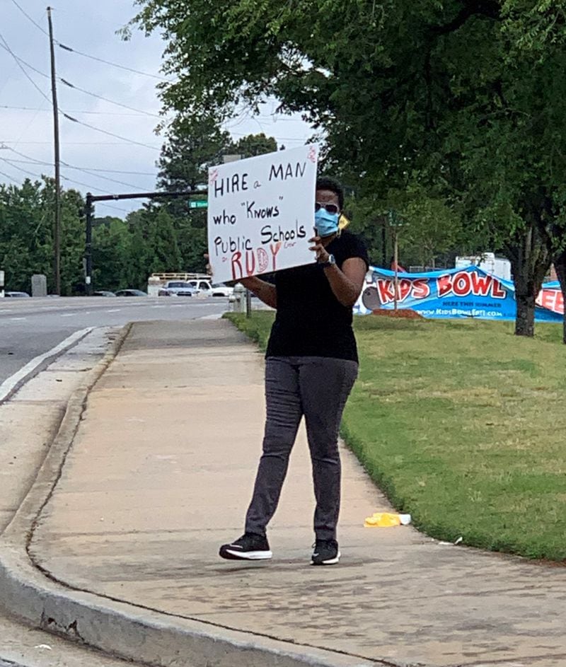 A photo provided by Georgia Federation of Teachers president Verdaillia Turner shows a protest outside the DeKalb County school board office on Monday, May 18, 2020.