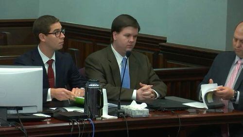 Justin Ross Harris sits with his lawyers as the jury files in to announce their verdict in Harris’ murder trial at the Glynn County Courthouse in Brunswick, Ga., on Monday, Nov. 14, 2016. Harris was found guilty on all eight charges. (screen capture via WSB-TV)