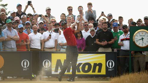 Tiger Woods draws a crowd at Carnoustie, just as he would at East Lake should he make the Tour Championship field. (Francois Nel/Getty Images)