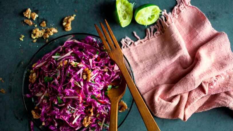 Asian red cabbage and walnut salad, in New York, Sept. 26, 2015. A dressing that includes both agave syrup and fish sauce provides a blend of sweet, salty and savory flavors.