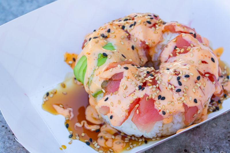 You can get a sushi doughnut (salmon and avocado) from Poke Burri at Ph'East. Ryan Fleisher for The Atlanta Journal-Constitution