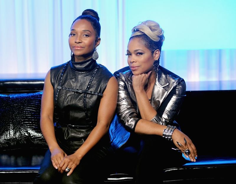 NEW YORK, NY - OCTOBER 14: Chilli and T-Boz of TLC Stop By Music Choice's "You & A" on October 14, 2013 in New York City. (Photo by Jamie McCarthy/Getty Images) Rozonda "Chilli" Thomas and Tionne "T-Boz" Watkins of TLC are being sued by their former manager Perri "Pebbles" Reid for defamation over the VH1 film "CrazySexyCool." CREDIT: Getty Images, 2013