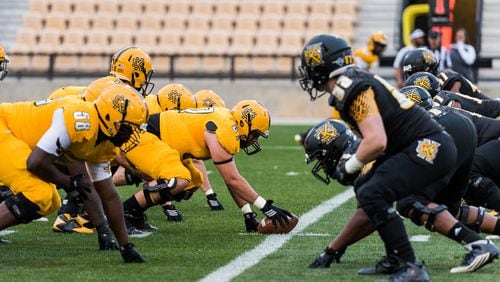The Gold and Black teams face off during the Kennesaw State spring football game March 24, 2017 at Fifth Third Bank Stadium.
